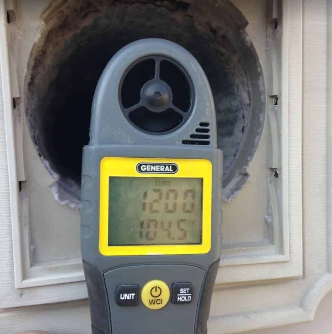 JCS Home Services airflow meter verifying restored airflow at a freshly cleaned vent in Chantilly VA